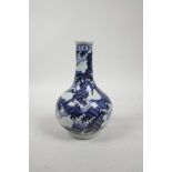 A Chinese blue and white Ming style porcelain vase decorated with mythical creatures, 6 character
