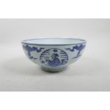 A Chinese blue and white bowl with decorative figural panels, 4 character mark to base, 8" diameter