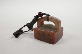 A Chinese red soapstone seal, 1½" x 2"