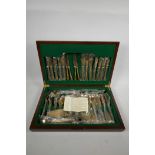A canteen of Thai 'Dynasty' solid bronze cutlery, eight settings, cased, mostly unopened