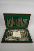 A canteen of Thai 'Dynasty' solid bronze cutlery, eight settings, cased, mostly unopened