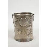 A Chinese silver pot/jar sheath with repousse chrysanthemum decoration, stamped 'Shanghai', and