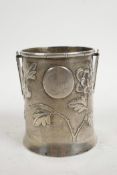 A Chinese silver pot/jar sheath with repousse chrysanthemum decoration, stamped 'Shanghai', and