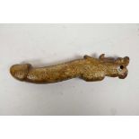 A Chinese hardstone phallic ornament, 8½" long