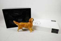 A Royal Doulton porcelain figure of a Golden Retriever, stamped to base, with original box, 7"