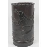 A Chinese carved bamboo brush pot carved as a frog catching a fly, 6" high