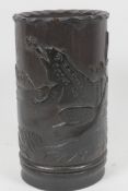 A Chinese carved bamboo brush pot carved as a frog catching a fly, 6" high