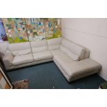 A Natuzzi leather corner sofa, 25" high x 44" deep