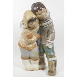 A large Lladro porcelain figure of two Inuit children, 15½" high