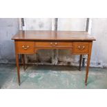 An inlaid mahogany three drawer writing/dressing table, 45" x 22" x 30"