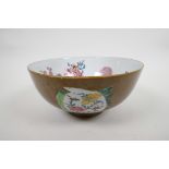 An C18th Chinese export porcelain Batavia ware bowl, lustre glazed brown ground with famille rose