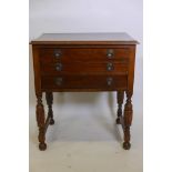 A mahogany three drawer canteen on turned and carved legs, 19" x 27", 30½" high