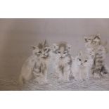 A Japanese silk embroidery of four kittens, late C19th/early C20th