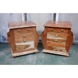 A pair of hardwood side cabinets with three drawers over a cupboard, and pockets to sides