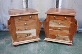 A pair of hardwood side cabinets with three drawers over a cupboard, and pockets to sides