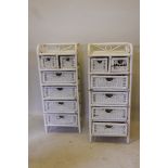 A pair of painted bamboo and cane chests of two over four basket drawers, 18" x 14" x 45"