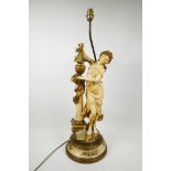 A painted spelter lamp in the form of a classical maiden, 30" high