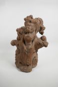 A Javanese terracotta figural ornament, 12½" high