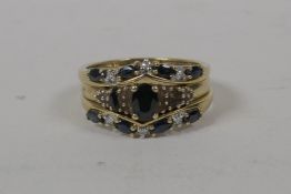 A 9ct gold ring set with sapphires, A/F one missing, and two 9ct gold rings set with sapphires, 5.
