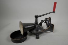 A late C19th Spong and Co cast iron meat mincer, 11" long x 7" wide