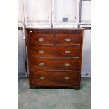 A Victorian mahogany bowfront chest of two over three drawers, with rounded corners, raised on a