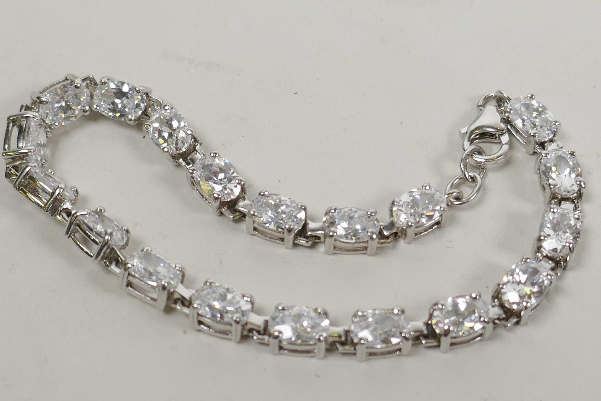 A 925 silver and cubic zirconium tennis bracelet, 8" long