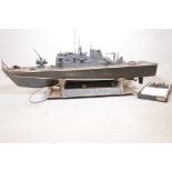 A radio controlled scratch built wood model of a German Navy fast patrol boat, length 52", beam 12"