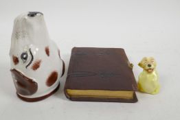 A small Royal Doulton porcelain figure of Bonzo the dog, 2" high, together with a Staffordshire