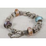 A Pandora silver charm bracelet, some set with crystal beads, gross 67g