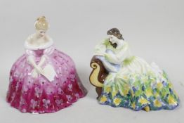 A Royal Doulton figurine, 'Solitude' HN2810, together with another Royal Doulton figurine 'Victoria'