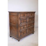 An Ipswich oak Queen Anne style chest of two short and three long drawers, 36" high, 37" wide, 20"