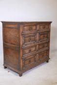 An Ipswich oak Queen Anne style chest of two short and three long drawers, 36" high, 37" wide, 20"