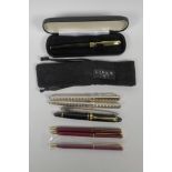 A Links of London silver plated fountain pen and matching ballpoint, a Liberty fountain pen, a