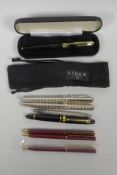 A Links of London silver plated fountain pen and matching ballpoint, a Liberty fountain pen, a