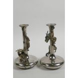 A pair of Oriental metal specimen vases with applied decoration of entwined dragons, 6" high