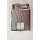 A Colibri Monopol watch lighter in silver plate, the watch recently serviced, c1950s