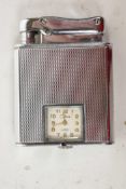 A Colibri Monopol watch lighter in silver plate, the watch recently serviced, c1950s
