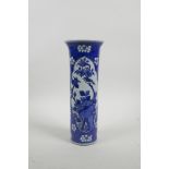 A Chinese blue and white porcelain sleeve vase with a flared rim and decorative panels depicting