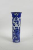 A Chinese blue and white porcelain sleeve vase with a flared rim and decorative panels depicting