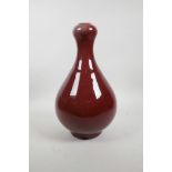 A Chinese flambe glazed garlic head shaped vase, 13½" high