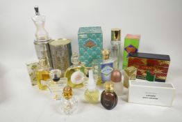 A box of vintage perfume bottles, some with contents, including Yves Saint Laurent, Givenchy, Dior