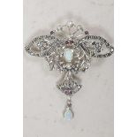 A silver and marcasite butterfly shaped pendant brooch set with opalite and rubies