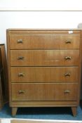 A mid century Harris Lebus oak chest of four drawers, 30" x 18", 37½" high