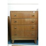 A mid century Harris Lebus oak chest of four drawers, 30" x 18", 37½" high