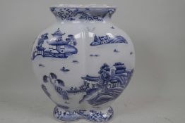 A Chinese blue and white double gourd vase decorated with a variation on the Willow Pattern, marks