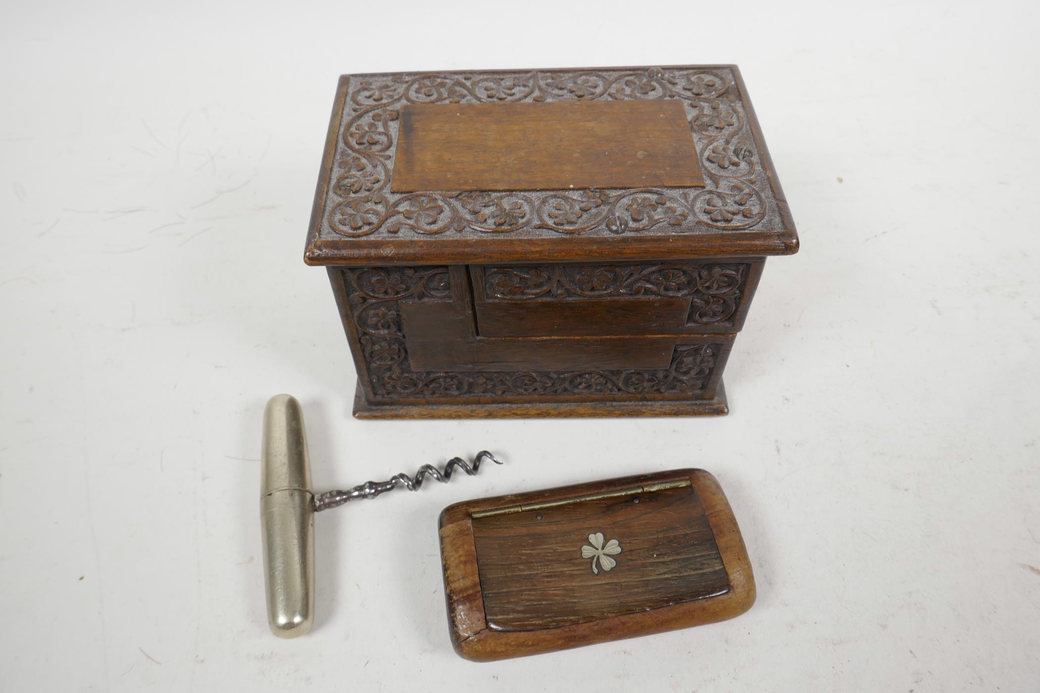 A small Kashmiri carved walnut card box, 4½" x 3" x 3", together with a carved hardwood snuff box