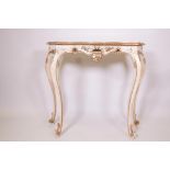 An Italian painted shaped top cabriole legged console table painted with flowers and butterflies,