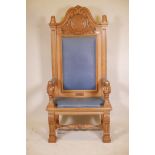 An oak throne chair presented to the Institution of Naval Architects, constructed from the beams