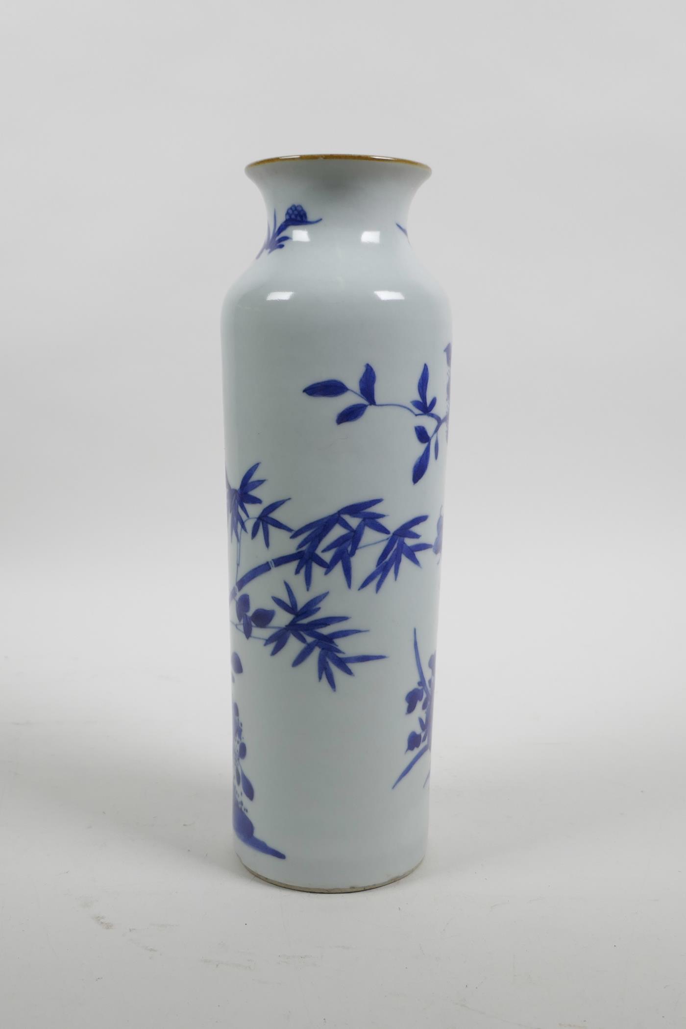 A Chinese blue and white porcelain cylinder vase decorated with birds and butterflies amongst bamboo - Image 3 of 5