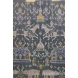 A framed Indonesian green ikat textile depicting figures, animals and temples, 36" x 39"
